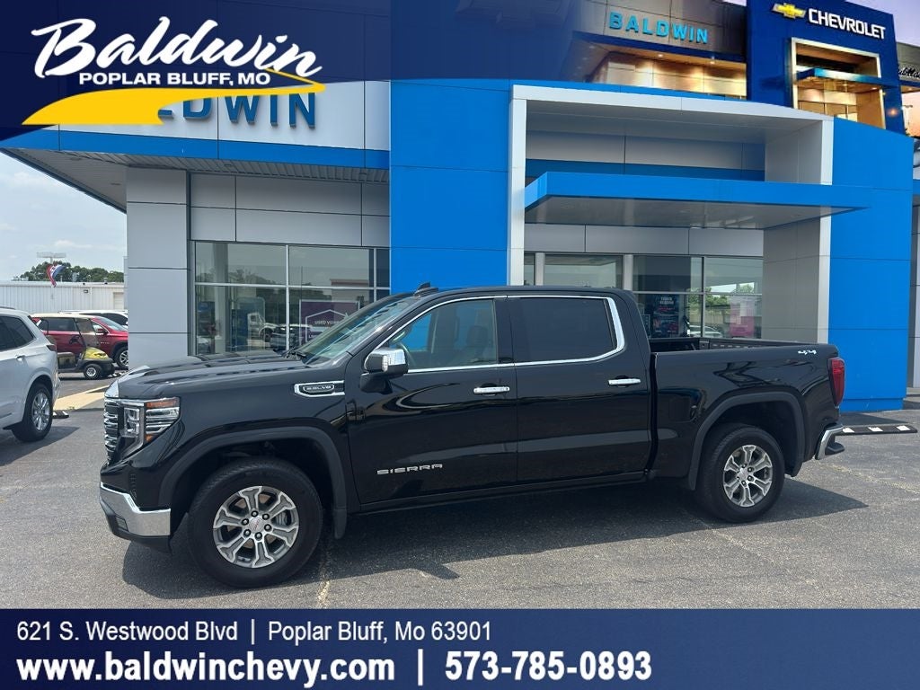 2024 GMC Sierra 1500 SLT in Onyx Black — front three-quarter view