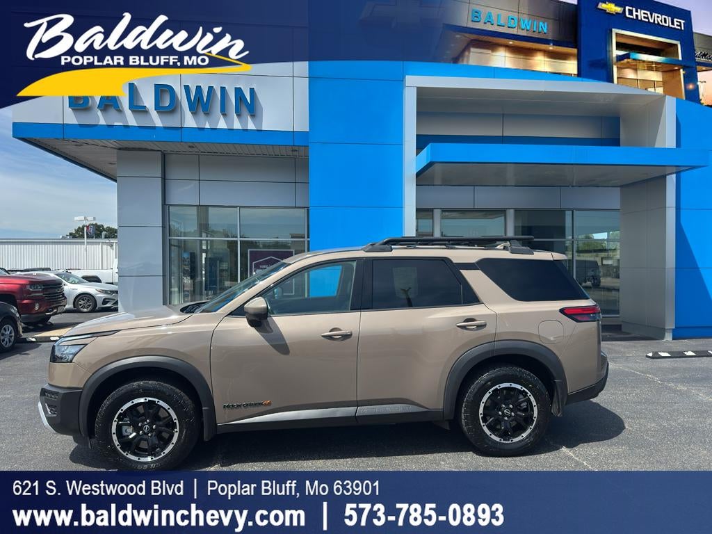 2023 Nissan Pathfinder Rock Creek in Brown — front three-quarter view