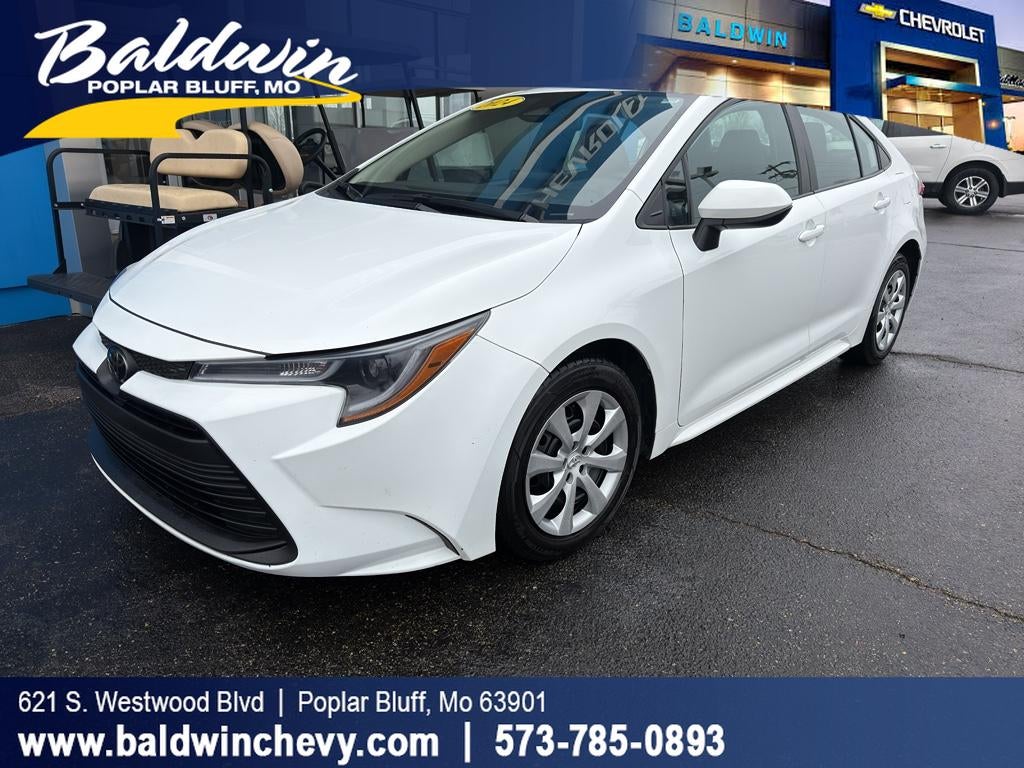 2024 Toyota Corolla LE in White — front three-quarter view