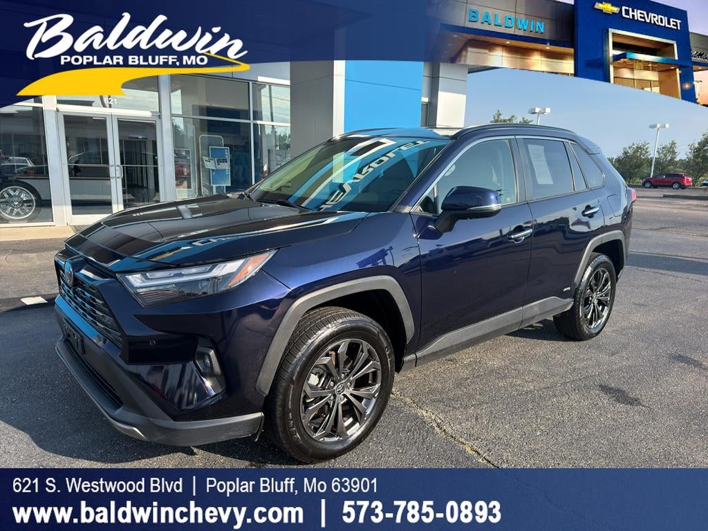 2023 Toyota RAV4 Hybrid Limited in Gray — front three-quarter view